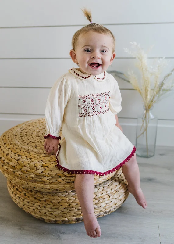 Elegant and noble Hand Smocked Crinkle Muslin Baby Dress (Organic)